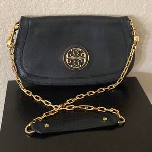 Tory Burch Navy clutch with shoulder chain.